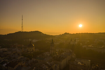 Naklejka premium Aerial view on Dominican Church and Dormition Church in Lviv, Ukraine from drone