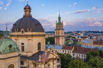 Fototapeta na wymiar Aerial view on Dominican Church and Dormition Church in Lviv, Ukraine from drone
