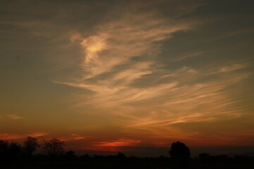 The Orange light of Sunrise ,silhouette and blue sky in the morning