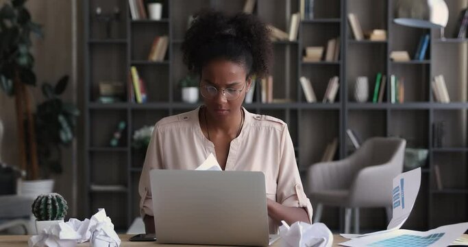 African woman sort out papers, throwing documents feels nervous due deadline unable control emotions, cant find right paper, need anxiety drugs to handle stress, calm nerves, business problems concept