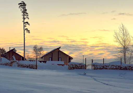Two houses on a winter morning