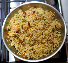 risotto is in a skillet in the kitchen