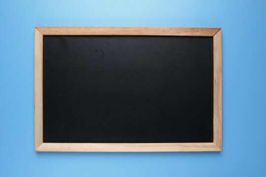 A picture of copyspace blackboard on blue background.