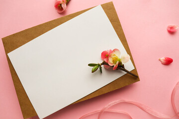 mockup greeting card. spring composition. blooming branch of azalea and envelope for text. congratulation. invitation