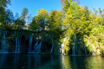 Exotic waterfall and lake landscape of Plitvice Lakes National Park, UNESCO natural world heritage and famous travel destination of Croatia