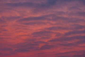 Winter morning clouds above Toten, Norway.