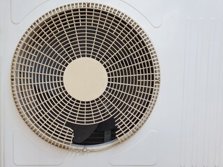 The Air compressor condensing fan's cover is torn due to outdoor installation and exposed to the...