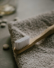 Bamboo toothbrush and toothpaste tabs. Zero-waste dental hygiene.