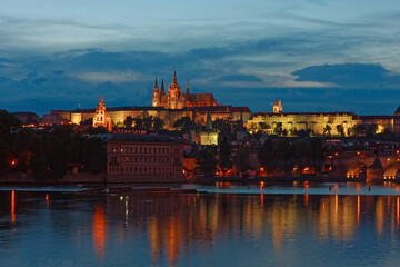 Fototapeta na wymiar Evening view of Prague Castle and Charles Bridge over Vltava river from Novotneho Lavka, Prague, Czech