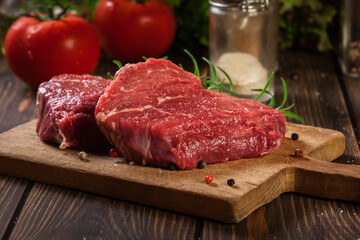 Fresh raw beef steak sirloin with rosemary - 404009882