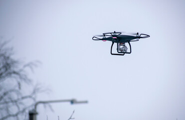 Aerial photography with a flying drone with a camera in winter.
