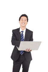 Asian young Business man Holding Laptop Computer 