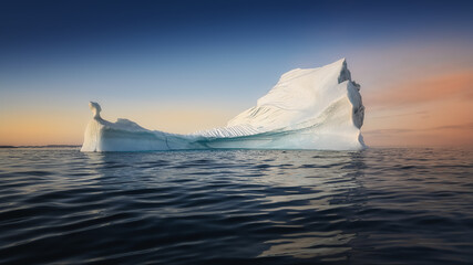 floating glaciers in the rays of the setting sun during a polar night