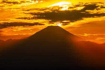 Fototapeta na wymiar 夕日と富士山