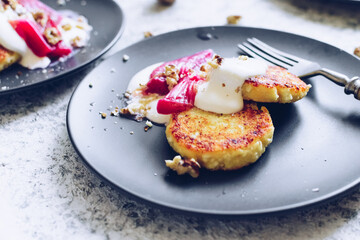 Cottage cheese pancakes with poached rhubarb