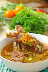 delicious beef rib soup in a white bowl