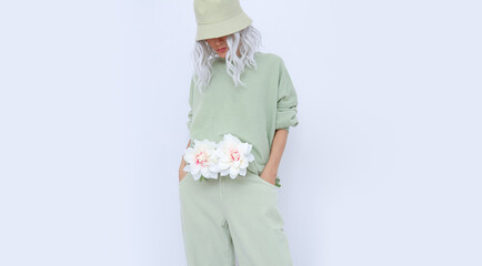  Female model in casual comfort  aqua menthe monochrome outfit. Spring summer fresh Street eco style concept