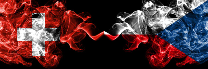 Switzerland, Swiss vs Czech Republic smoky mystic flags placed side by side. Thick colored silky abstract smoke flags.
