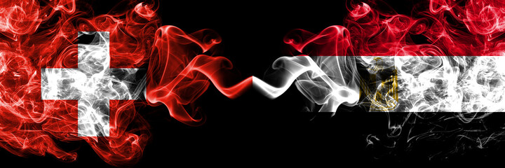 Switzerland, Swiss vs Egypt, Egyptian smoky mystic flags placed side by side. Thick colored silky abstract smoke flags.