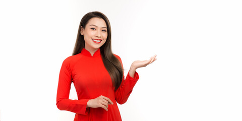 Asian woman in Traditional vietnamese ao dai gesturing