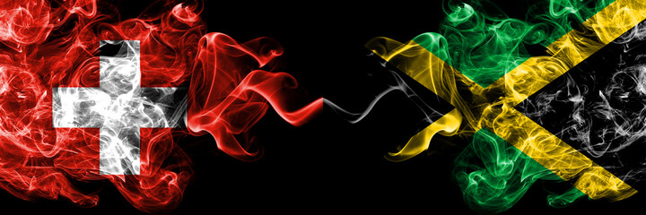Switzerland, Swiss vs Jamaica, Jamaican smoky mystic flags placed side by side. Thick colored silky abstract smoke flags.