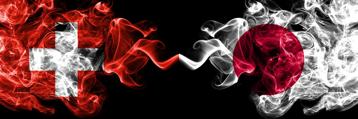 Switzerland, Swiss vs Japan, Japanese smoky mystic flags placed side by side. Thick colored silky abstract smoke flags.