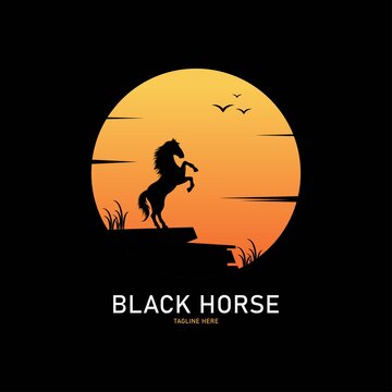 Black horse silhouette logo on sunset background