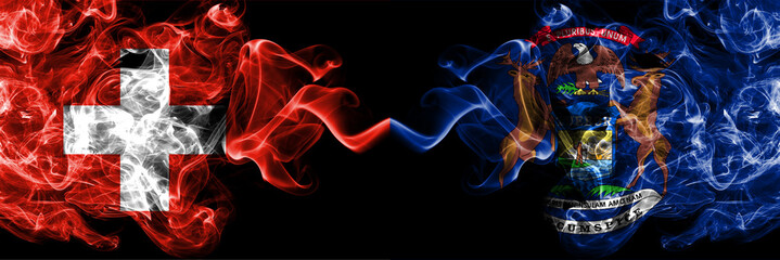 Switzerland, Swiss vs United States of America, America, US, USA, American, Michigan smoky mystic flags placed side by side. Thick colored silky abstract smoke flags.