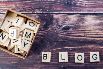 wooden alphabet letters spelling the word blog 