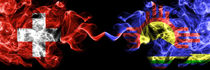 Obraz premium Switzerland, Swiss vs United States of America, America, US, USA, American, Roswell, New Mexico smoky mystic flags placed side by side. Thick colored silky abstract smoke flags.