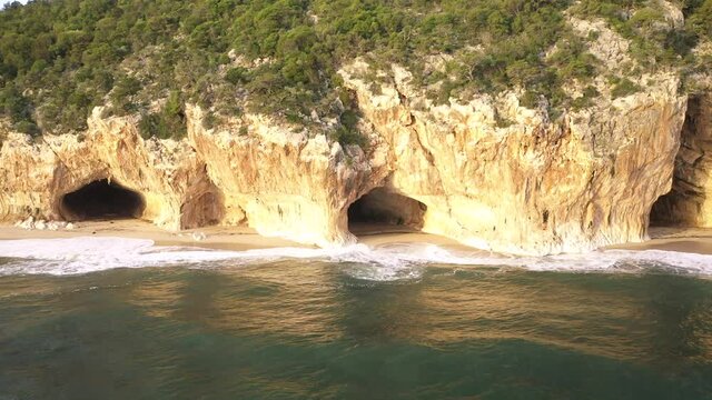 Aerial of the beautiful Cala Luna Caves and Beach on Sardinia, Italy