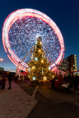 Christmas time in a city with ferris wheel. December 22, 2020. Zlin, Czech Republic.