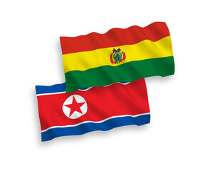 Flags of North Korea and Bolivia on a white background