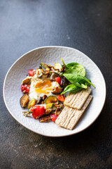 fried eggs with vegetables omelet ready to cook and eat on the table for healthy meal snack outdoor top view copy space for text food background rustic image keto or paleo diet