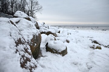 Icy beach witch rocks