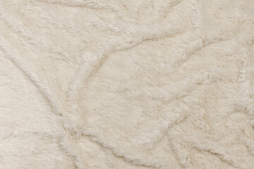 Champagne color fur background..Flat lay photography.