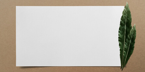 white paper with green leaf on brown paper background with copy space 3D illustration