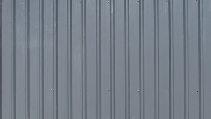 Outdoor temporary corrugated gray wall partition