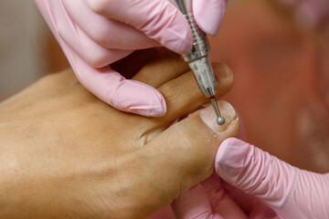 Professional hardware pedicure close up