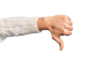 Hand of caucasian young man showing fingers over isolated white background doing thumbs down rejection gesture, disapproval dislike and negative sign