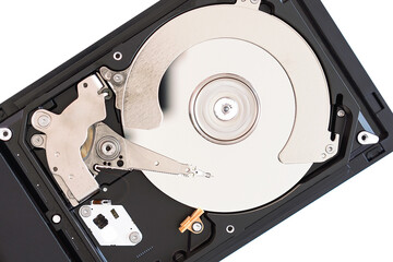 Working inside the hard disk, the pin head is reading and writing data on a disk coated with magnetic particles. White background, Top view.
