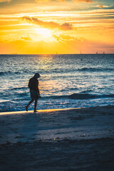 silhouette of a person on the beach