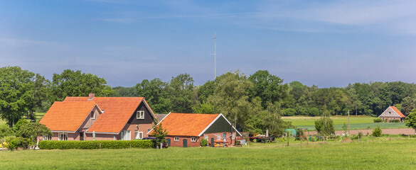 Fototapeta na wymiar Panorama of a farm in the hills near Vasse, Netherlands