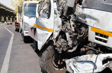 Closeup of front side of damaged truck car from heavy road traffic accident. 