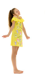 The little girl spread her arms to the sides, children's emotions.