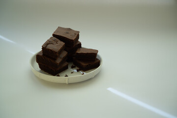 Chocolate brownie bits with place for text.