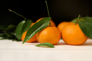 tangerines with leaves, orange color