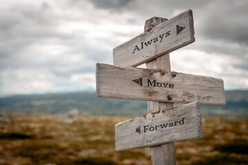 always move forward signpost outdoors in nature