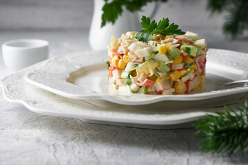 crab stick salad served in white plate on grey stone table Healthy food © Natalya