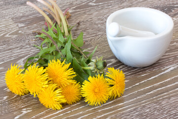 Dandelion with mortar and pestle